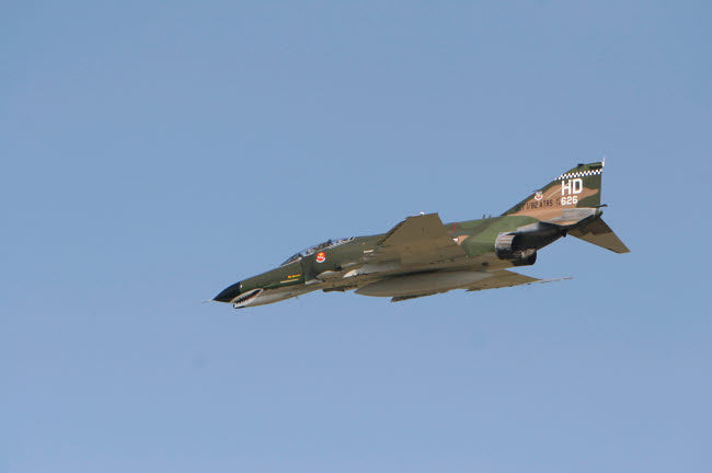 F-4 Phantom fighter jet in flight over Houston Texas poster print