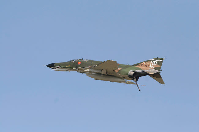 F-4 Phantom Jet in Flight Over Houston Poster Print