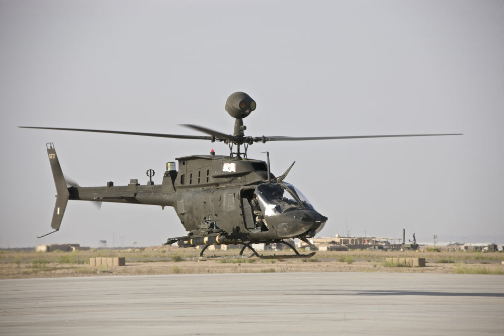 OH-58D Kiowa Helicopter Taking Off from COB Speicher, Iraq Poster Print
