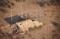 Aerial view of a destroyed Iraqi ammunition magazine poster print.