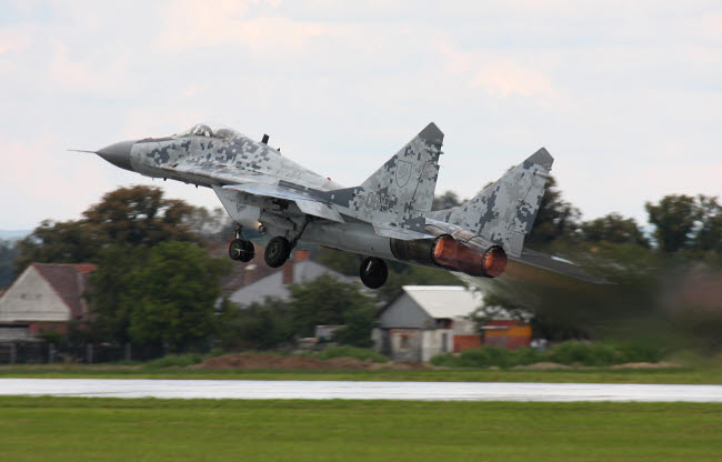 Slovak Air Force MIG-29 Fulcrum Taking Off Poster Print by Timm Ziegenthaler