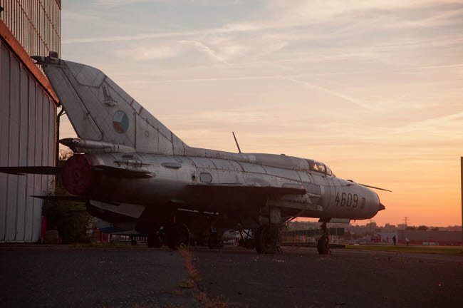 Poster print of a derelict MiG-21 from the Czech Air Force by Timm Ziegenthaler.
