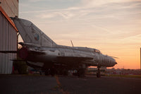 Poster print of a derelict MiG-21 from the Czech Air Force by Timm Ziegenthaler.