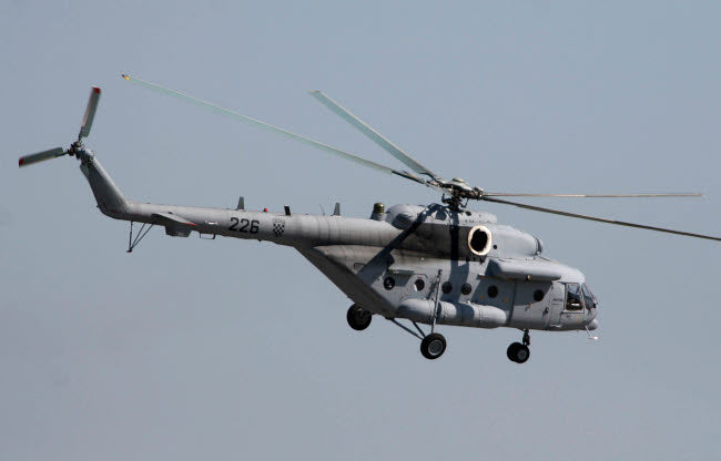 Mil Mi-17 helicopter in flight over Germany poster print by Timm Ziegenthaler.