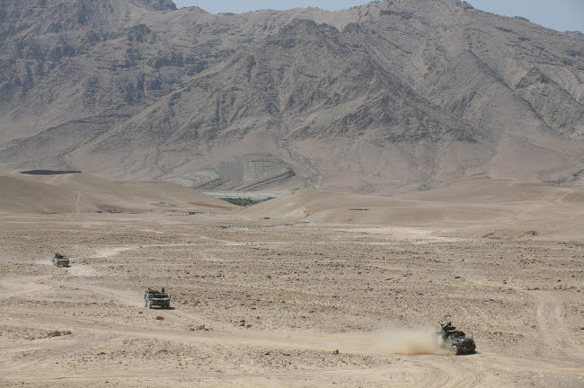 Convoy of Dutch Army Vehicles in Afghanistan Poster Print