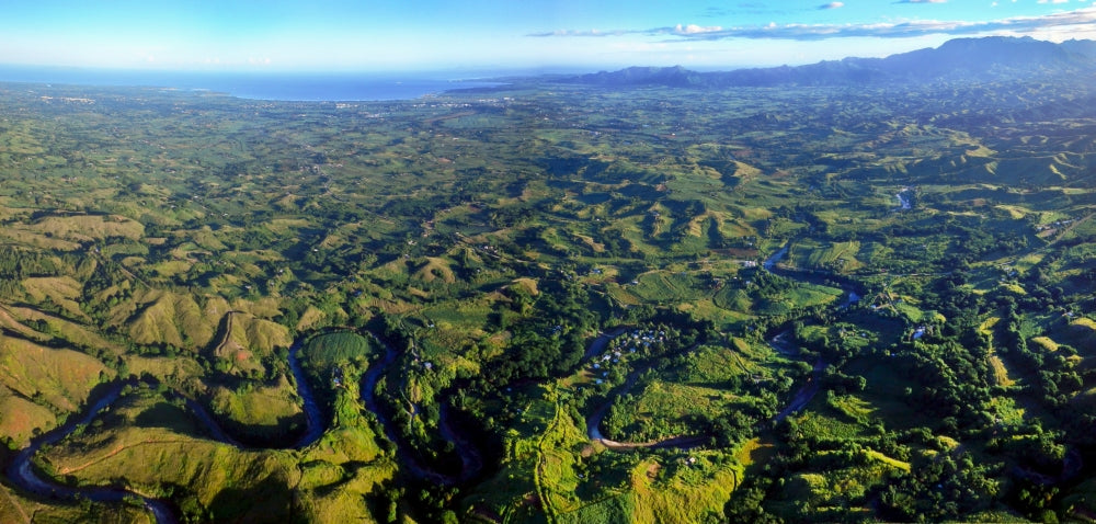 Nadi River aerial view poster print showcasing Fiji's landscapes with Sleeping Giant mountains.