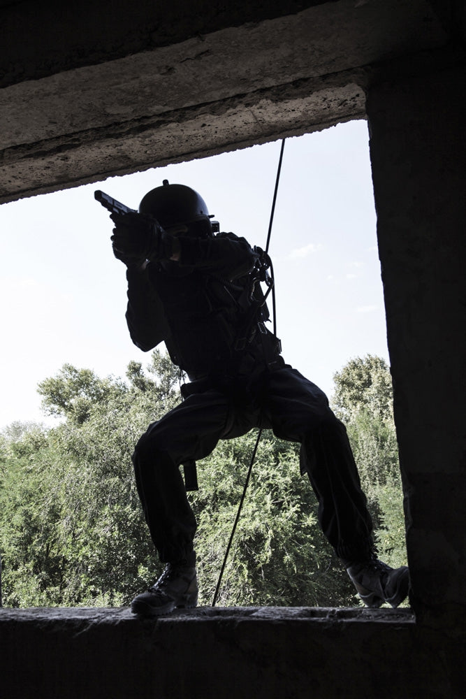 Spec Ops soldier in face mask during rope exercises with weapons - Poster Print