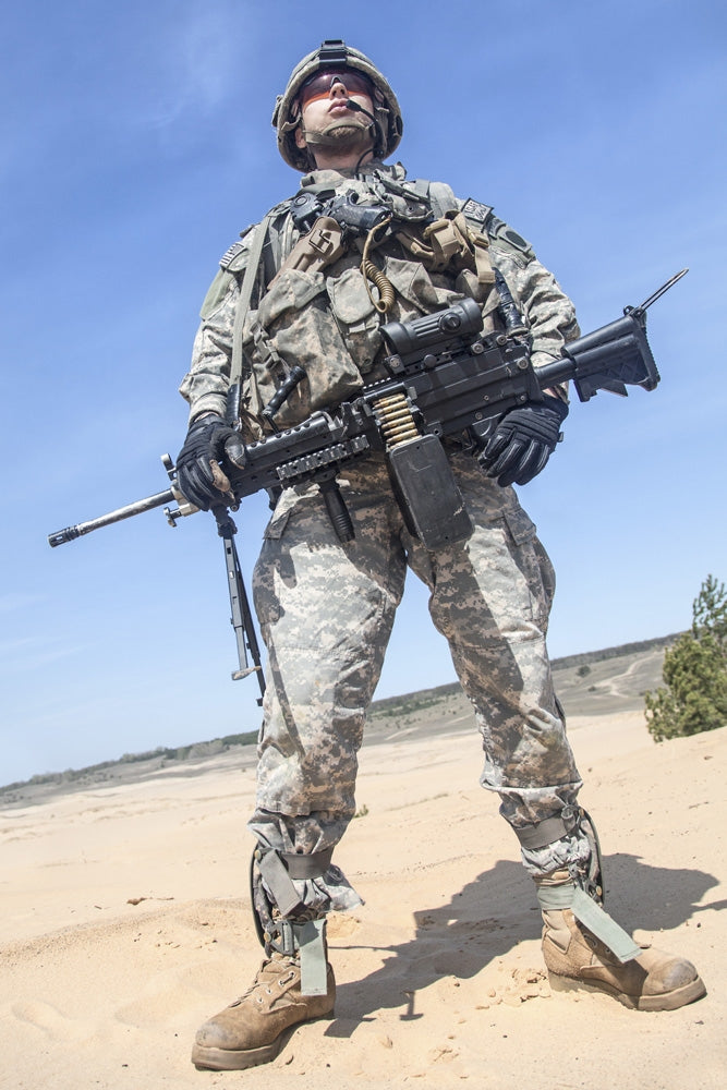 Portrait of a United States Airborne Infantry Corporal with a machine gun poster print.