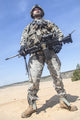 Portrait of a United States Airborne Infantry Corporal with a machine gun poster print.