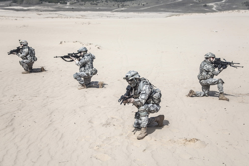 Team of United States Airborne Infantry in action in the desert poster print by Oleg Zabielin.