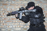 Special Forces Operator in black uniform and bulletproof vest poster print.