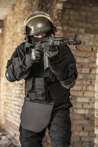 Special Forces Operator Poster Print featuring a soldier in black uniform and bulletproof vest.
