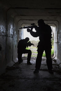 Silhouette of special forces operators in a tunnel poster print by Oleg Zabielin.