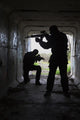 Silhouette of special forces operators in a tunnel poster print by Oleg Zabielin.