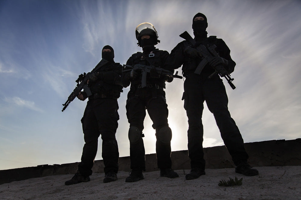 Silhouette of Special Forces Operators Poster Print by Oleg Zabielin