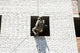 Soldier rappelling during assault exercises poster print by Oleg Zabielin