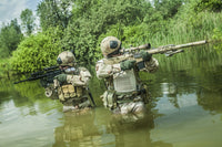 Navy SEALs crossing the river with weapons poster print by Oleg Zabielin