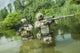 Navy SEALs crossing the river with weapons poster print by Oleg Zabielin