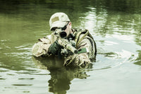 Navy SEAL Team crossing the river with weapons - Poster Print by Oleg Zabielin