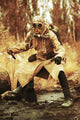Post-apocalypse survivor in gas mask standing on urban ruins art print by Oleg Zabielin.