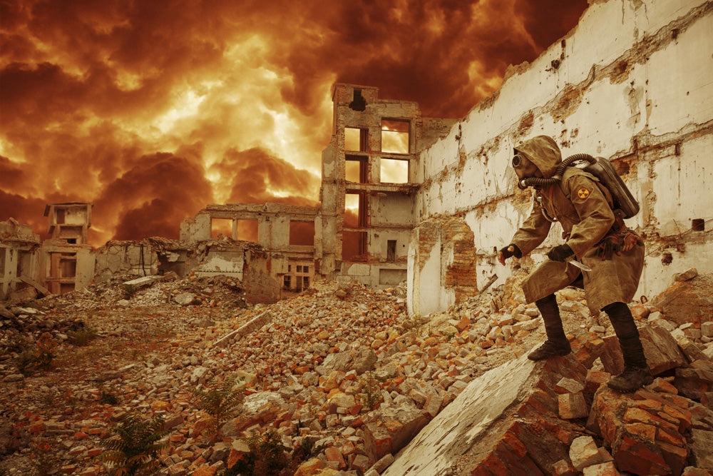 Post apocalypse survivor in gas mask standing on ruins of a destroyed city art print.