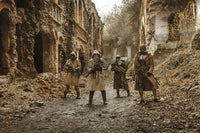 Post-apocalyptic survivors in tatters and gas masks on the ruins of a destroyed city artwork by Oleg Zabielin.