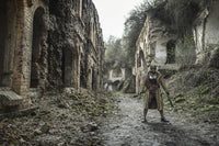Post-apocalypse survivor in gas mask on ruins, Oleg Zabielin poster print.