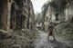 Post-apocalypse survivor in gas mask on ruins, Oleg Zabielin poster print.