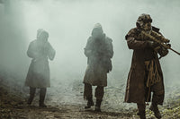 Nuclear post-apocalypse survivors in ruins poster print by Oleg Zabielin