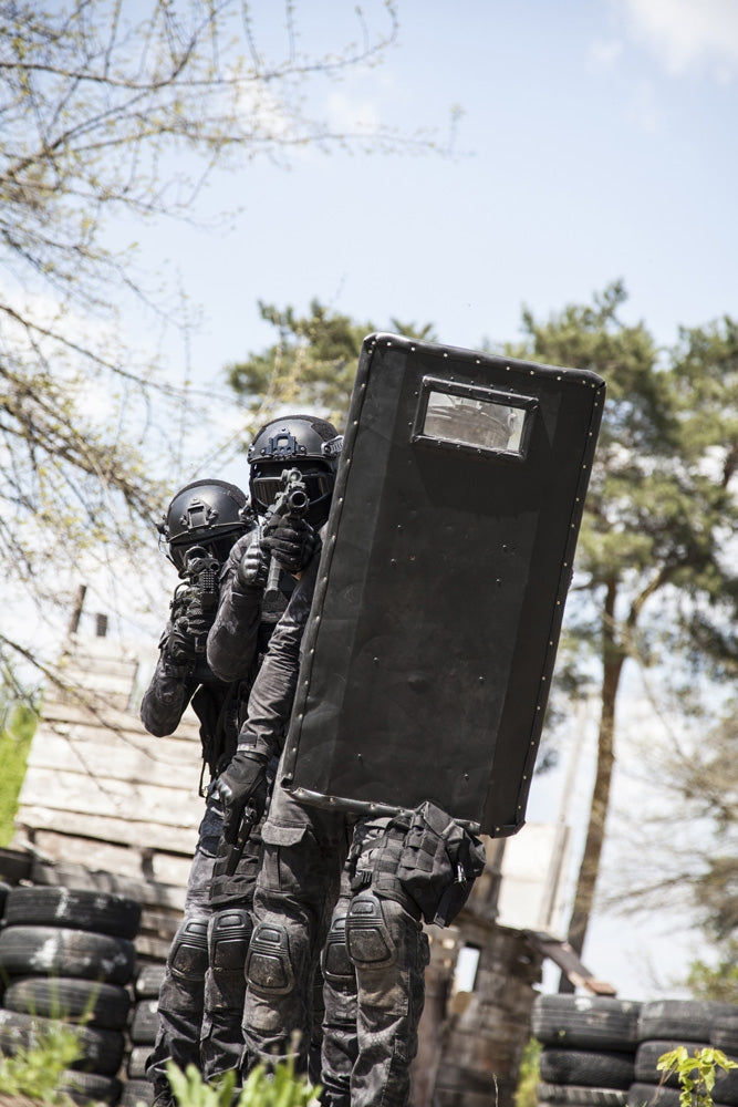 Spec Ops police officers SWAT in black uniform in action poster print by Oleg Zabielin.