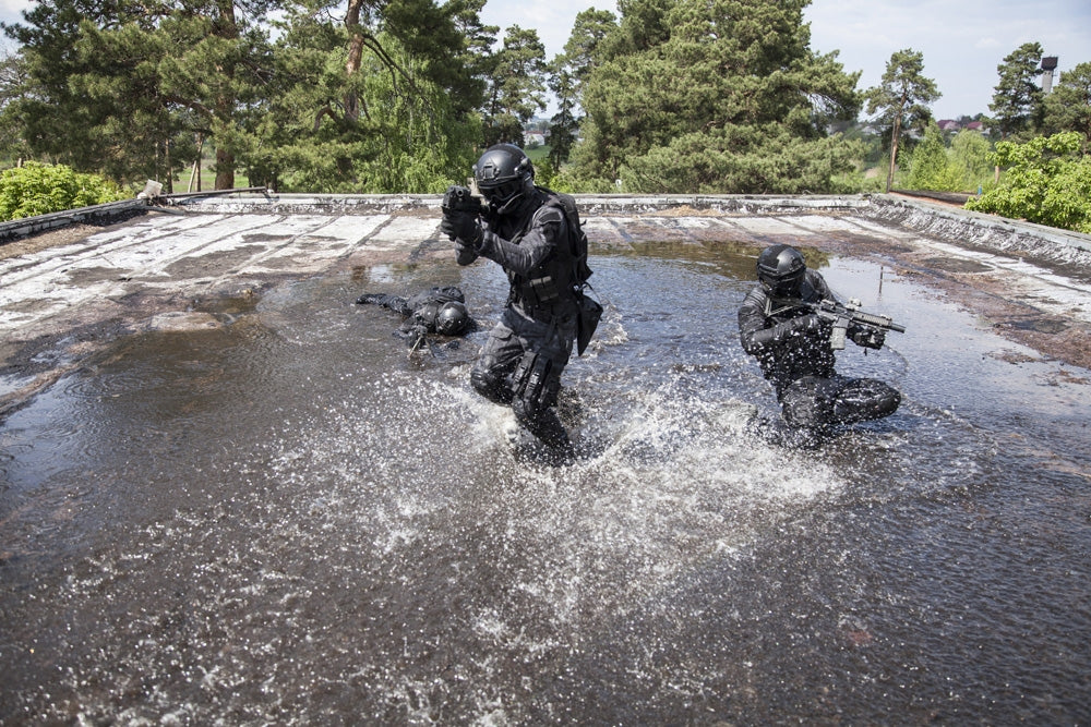 Spec Ops Police Officers SWAT in action poster print by Oleg Zabielin.