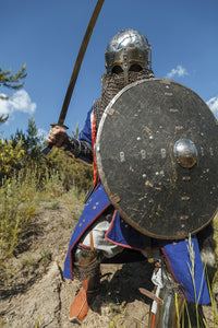 Mongol horde warrior in traditional armour holding saber poster print
