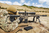 Young Male Sniper in Camouflage Poster Print by Oleg Zabielin