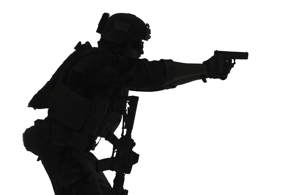 Silhouette of a U.S. Marine Corps Marsoc raider aiming pistol poster print.