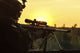 Silhouette of Army Sniper Poster Print by Oleg Zabielin, sunset background.