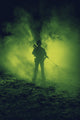 Army sniper with large caliber rifle poster print by Oleg Zabielin, depicting action in fire and smoke.