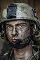 Close-up portrait of a young U.S. Army Ranger wearing a combat helmet.
