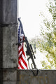 Large Caliber Sniper Rifle with U.S. Flag Poster Print by Oleg Zabielin