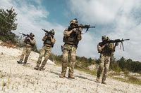 U.S. Army Rangers fire team in the desert poster print by Oleg Zabielin
