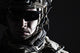 Elite U.S. Army Ranger in combat helmet and dark glasses poster print.