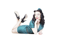 Beautiful brunette pin-up girl poster print with legs in the air.
