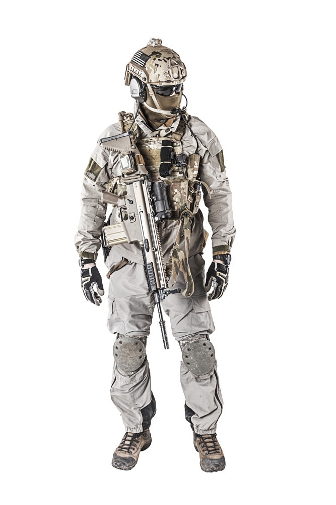 Army Soldier in Protective Combat Uniform holding assault rifle poster print