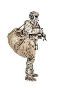 Soldier standing with duffle gym bag poster print by Oleg Zabielin.