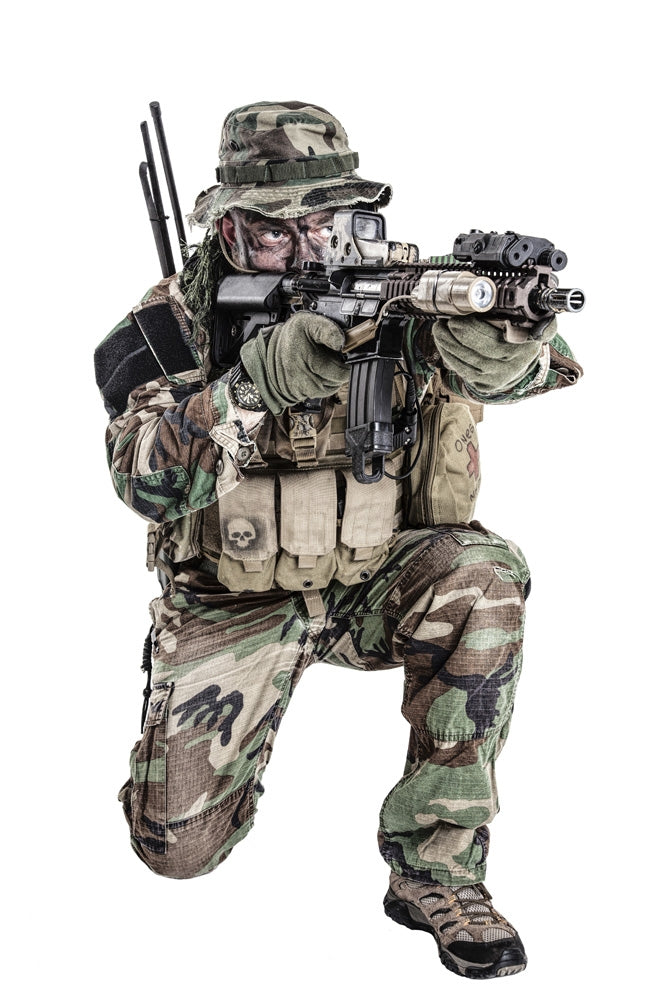 U.S. Special Forces soldier in camouflage uniform shooting in kneeling position - Poster Print