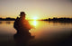 Silhouette of special forces soldier during a river raid in the jungle poster print.