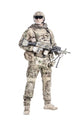 Full-length portrait of muscular soldier in field uniform with machine gun.