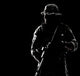 Bearded Special Forces soldier portrait in backlight, military art print.
