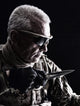 Close-up studio shot of special forces white-haired veteran with knife poster print.