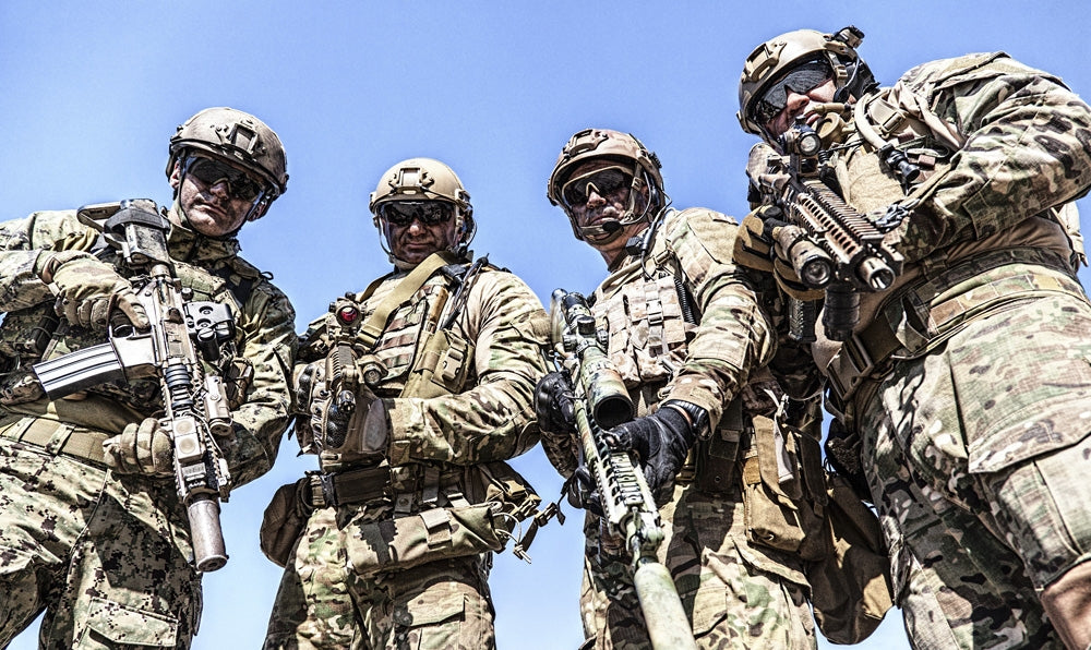 Special Forces Soldiers Poster Print by Oleg Zabielin featuring soldiers with weapons.