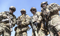 Special Forces Soldiers Poster Print by Oleg Zabielin featuring soldiers with weapons.